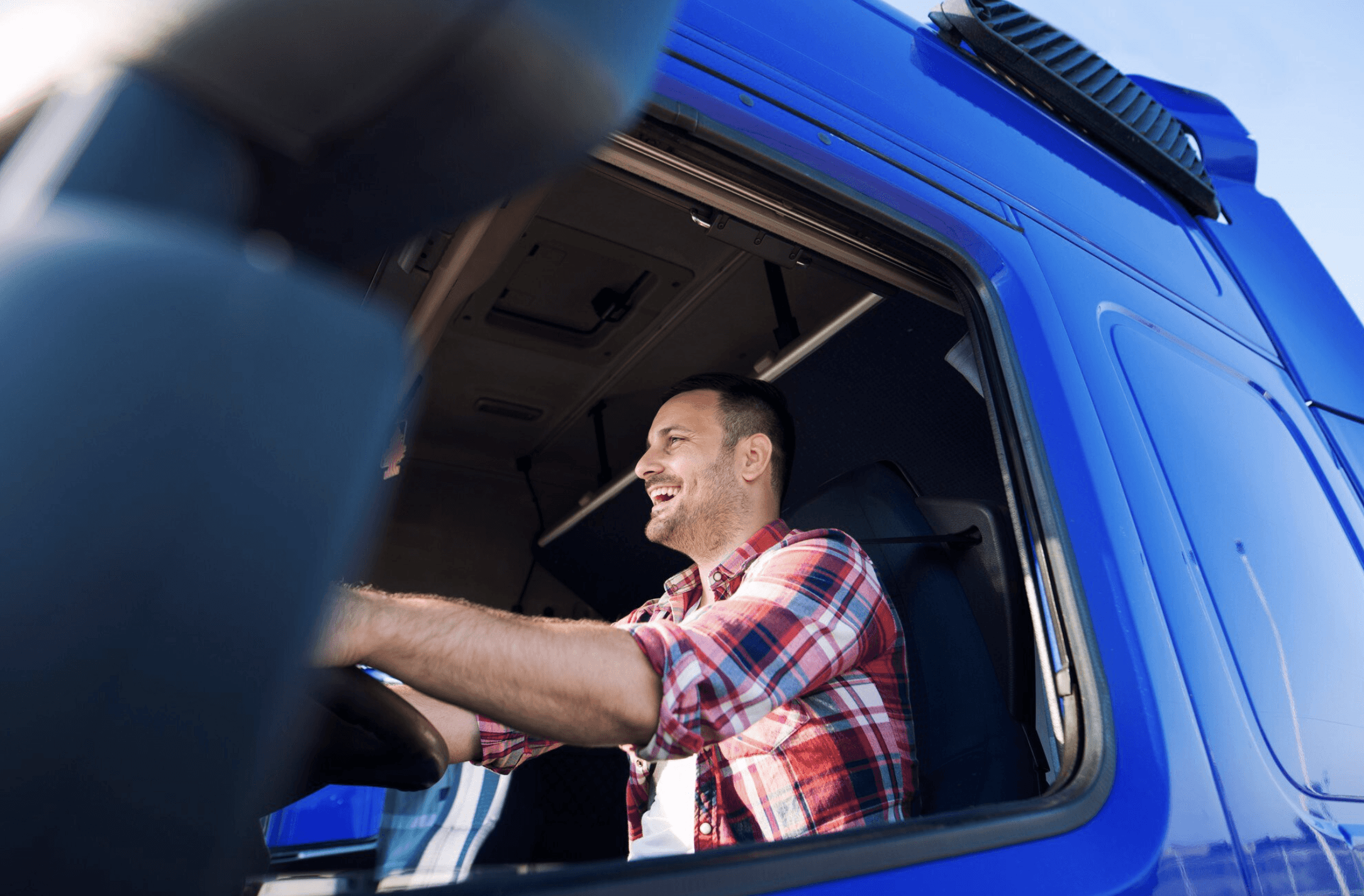 lady checking her phone and smiling
